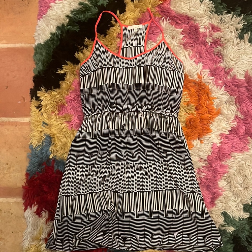Nice light weight dress, worn once sz L ,orange, cream and black